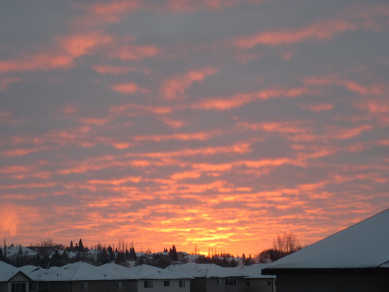 Snow-covered Houses at Sunset — Orange, Dramatic, Winter