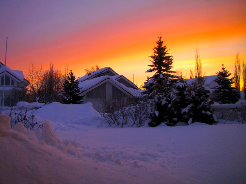 Snow-covered Houses at Sunset — Orange, Serene