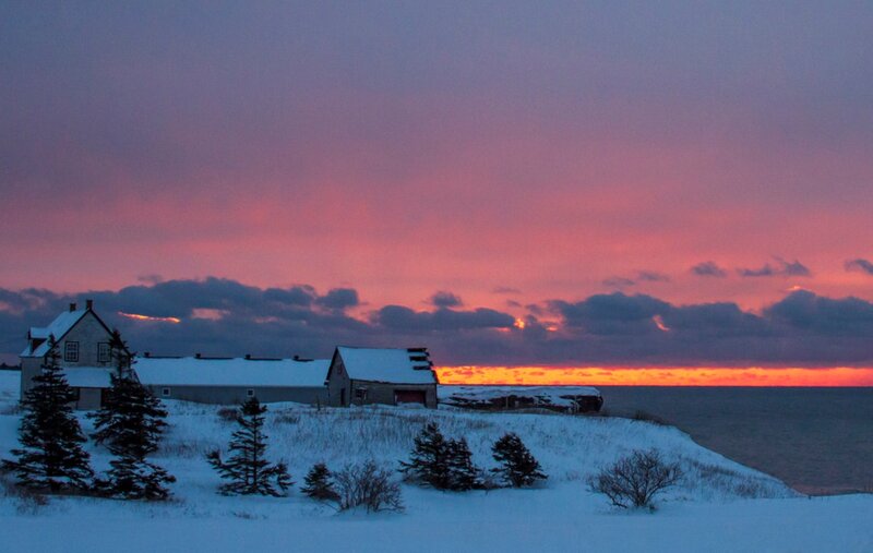 Snow-covered Houses by Sea