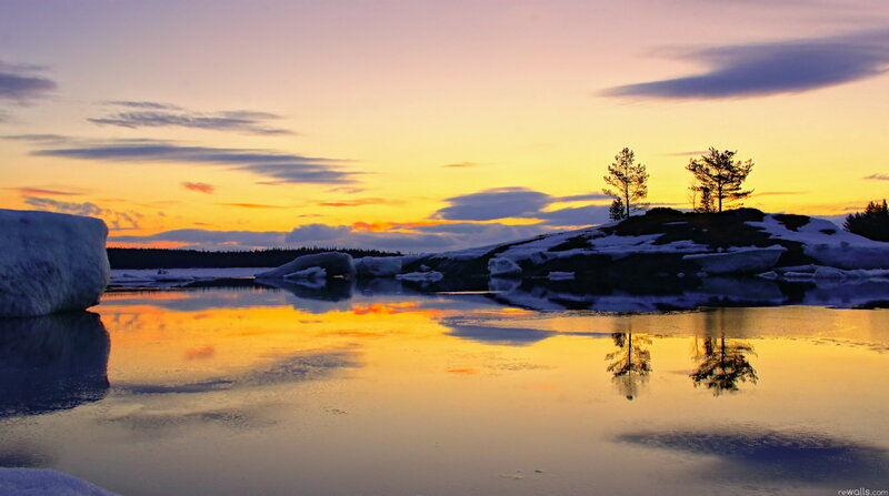 Snow-covered Island at Sunset