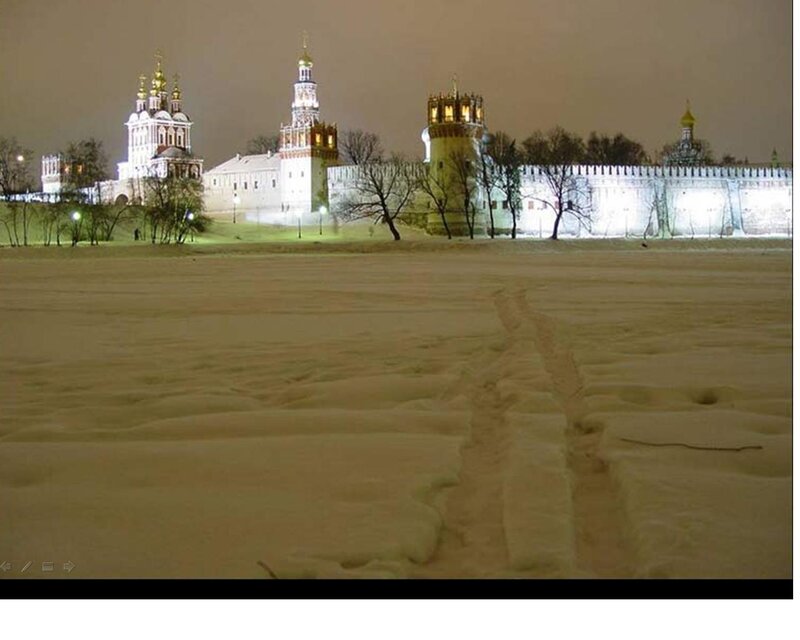 Snow-covered Kremlin at Night