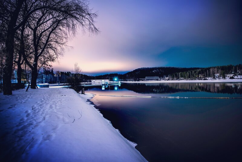 Snow-covered Lake at Dusk — Blue, Serene, Winter, Photograph, Trees