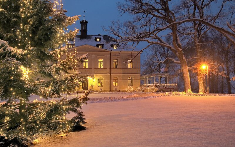 Snow-covered Mansion at Night