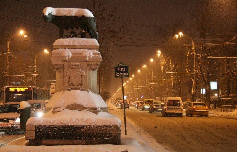 Snow-covered Monument at Night