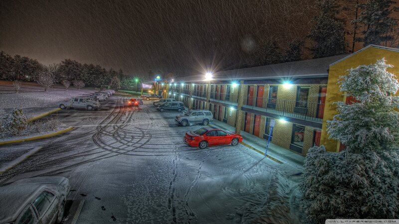 Snow-covered Motel at Night