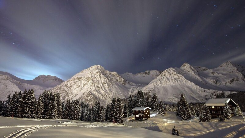 Snow-covered Mountain Cabin — White, Serene, Night, Photograph, Mountains, Trees, Stars