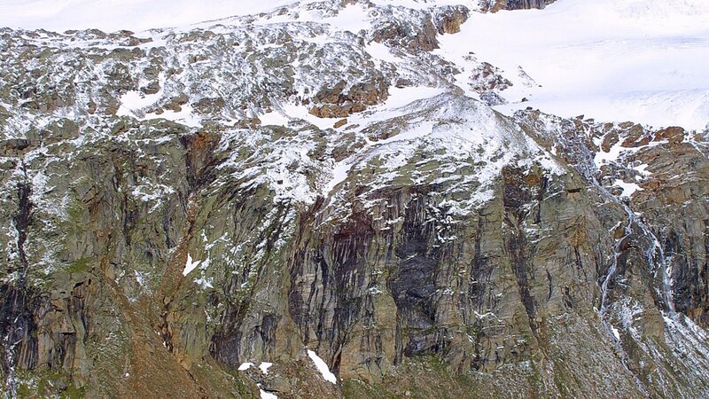 snow-covered mountain cliff
