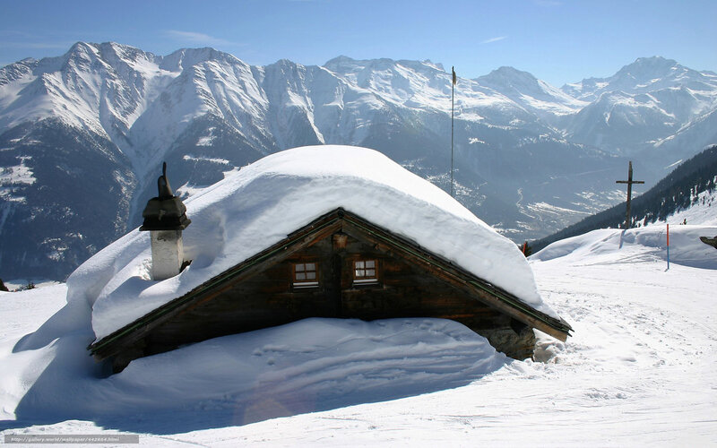 Snow-covered mountain hut