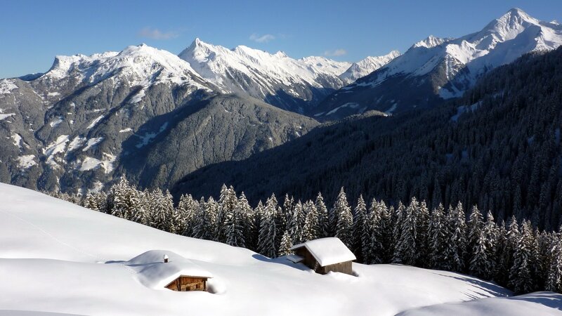Snow-covered Mountain Huts — White, Serene