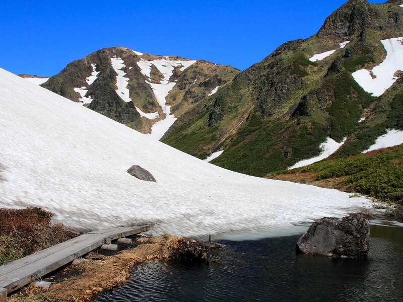 Snow-covered Mountain Lake — Blue, Serene, Summer