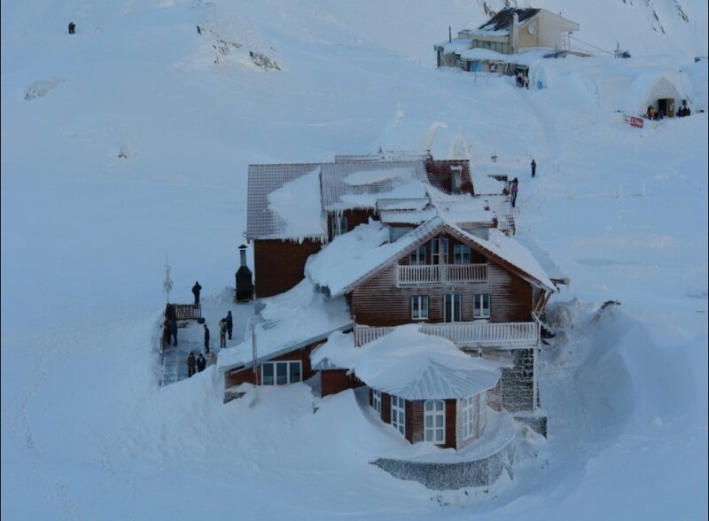 Snow-covered Mountain Lodge