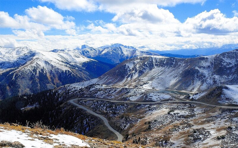 Snow-covered Mountain Pass — Blue, Serene, Winter, Photograph, Mountains, Road, Clouds, White
