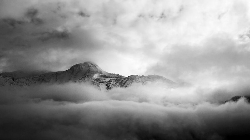 Snow-covered Mountain Peak — Black, Dramatic, Photograph, Clouds