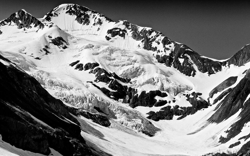 Snow-covered Mountain Peak — Black, Dramatic, Photograph