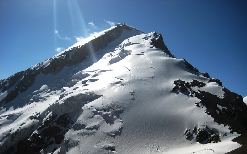 Snow-covered Mountain Peak — Blue, Dramatic, Afternoon, Photograph, Snow, Sky