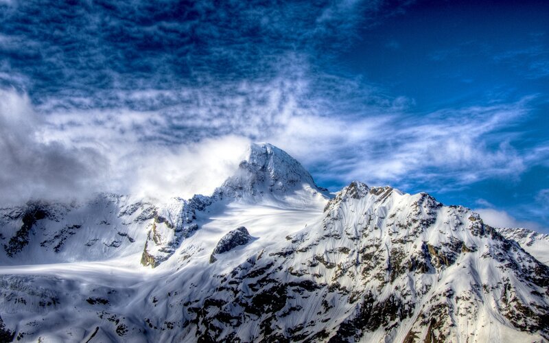 Snow-covered Mountain Peak — Blue, Dramatic, Photograph, Clouds, Sky, Rock