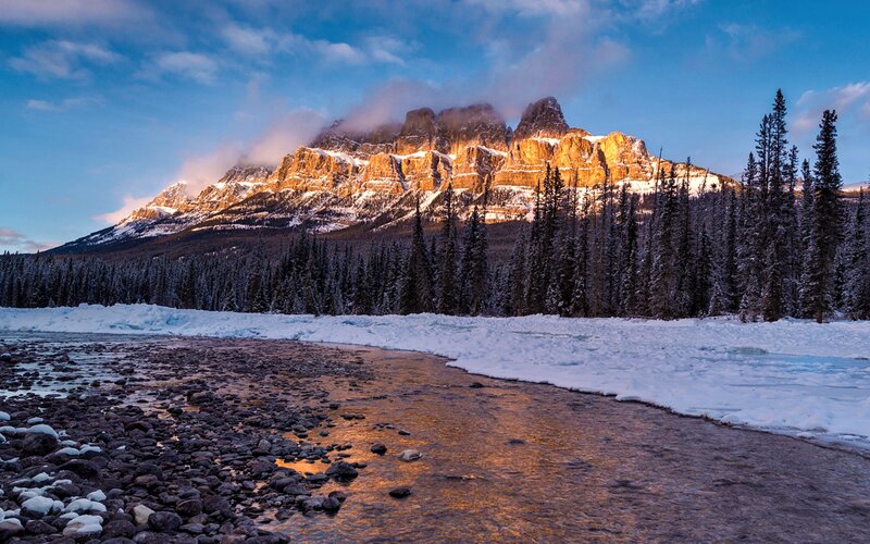 Snow-covered Mountain Peak — Blue, Dramatic, Winter, Photograph, River, Forest, Clouds