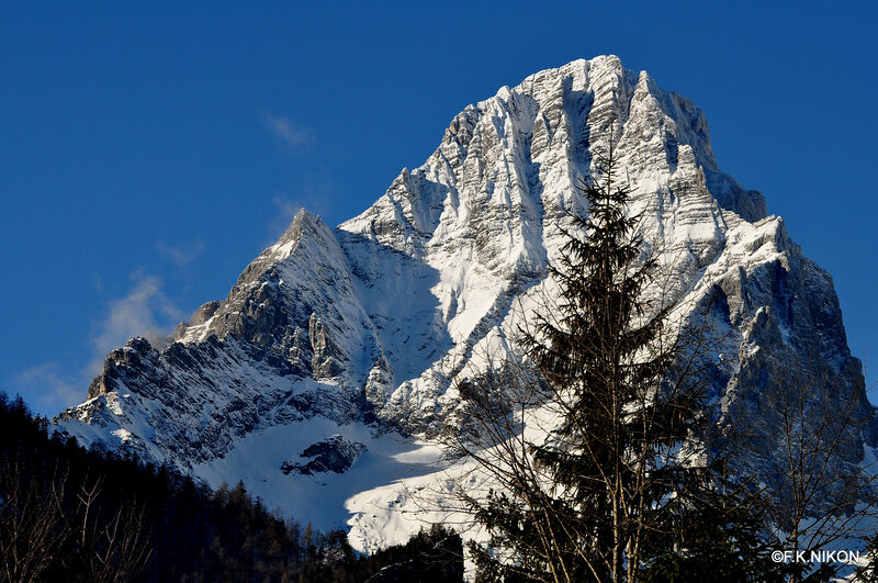 Snow-covered Mountain Peak — Blue, Dramatic, Winter, Photograph, Tree