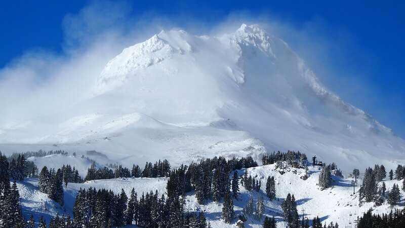 Snow-covered Mountain Peak — Blue, Dramatic, Winter, Photograph, Trees, Clouds