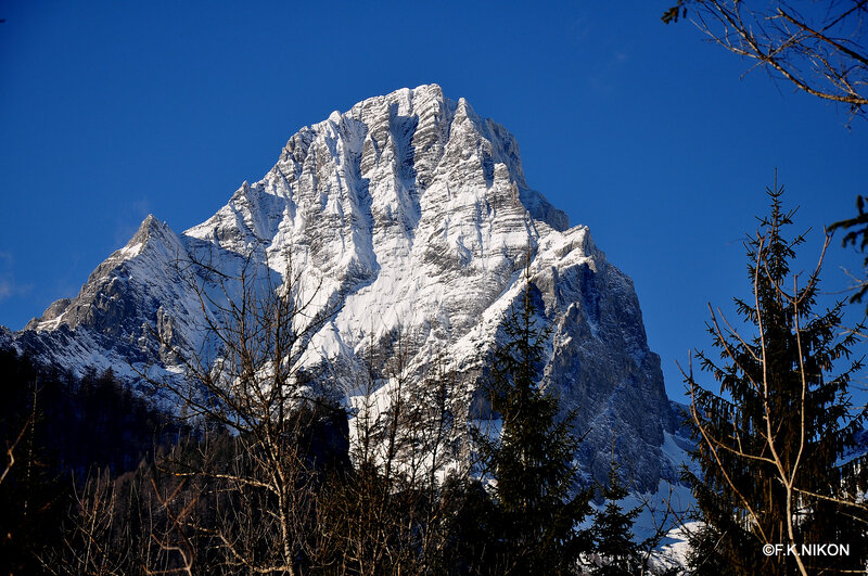 Snow-covered Mountain Peak — Blue, Dramatic, Winter, Photograph, Trees, Sky