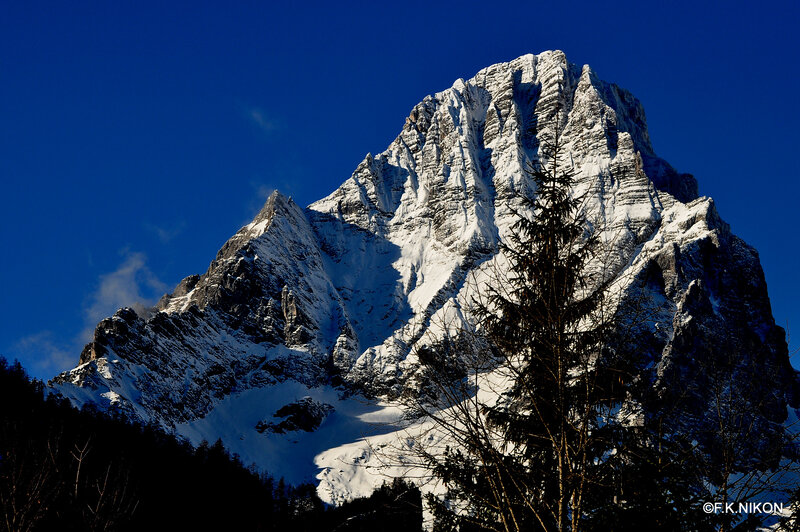 Snow-covered Mountain Peak — Blue, Dramatic, Winter, Photograph, Trees