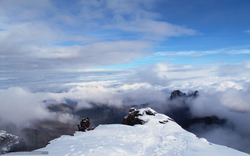 Snow-covered Mountain Peak — Blue, Serene, Winter, Photograph, Clouds, Mountains