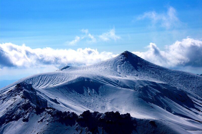 Snow-covered Mountain Peak — Blue, Serene, Winter, Photograph, Clouds, Sky