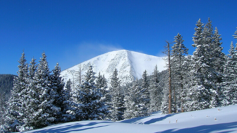 Snow-covered Mountain Peak — Blue, Serene, Winter, Photograph, Evergreen Trees, Snow