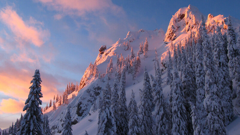 Snow-covered Mountain Peak — Blue, Serene, Winter, Photograph, Pine Trees, Clouds