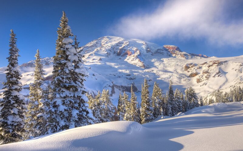 Snow-covered Mountain Peak — Blue, Serene, Winter, Photograph, Pine Trees, Snow, Clouds, White, Green