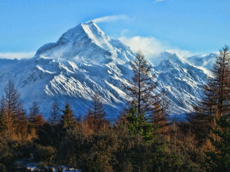 Snow-covered Mountain Peak — Blue, Serene, Winter, Photograph, Trees, Clouds