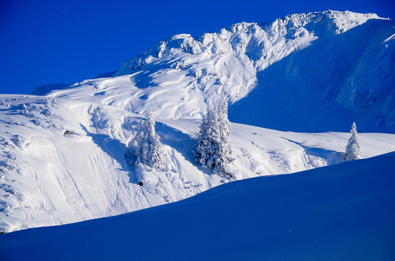 Snow-covered Mountain Peak — Blue, Serene, Winter, Photograph, Trees, Sky, Snow