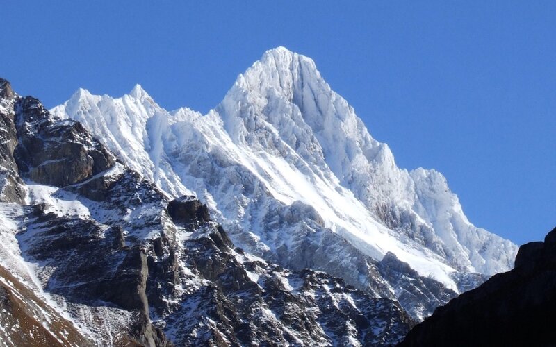 Snow-covered Mountain Peak — Dramatic, Afternoon