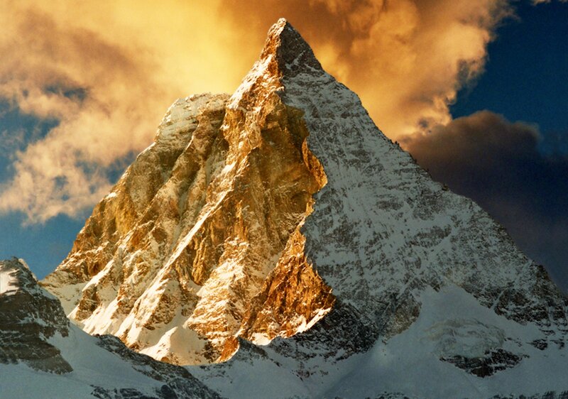 Snow-covered Mountain Peak — Gold
