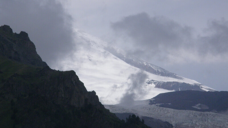 Snow-covered Mountain Peak — Gray, Overcast