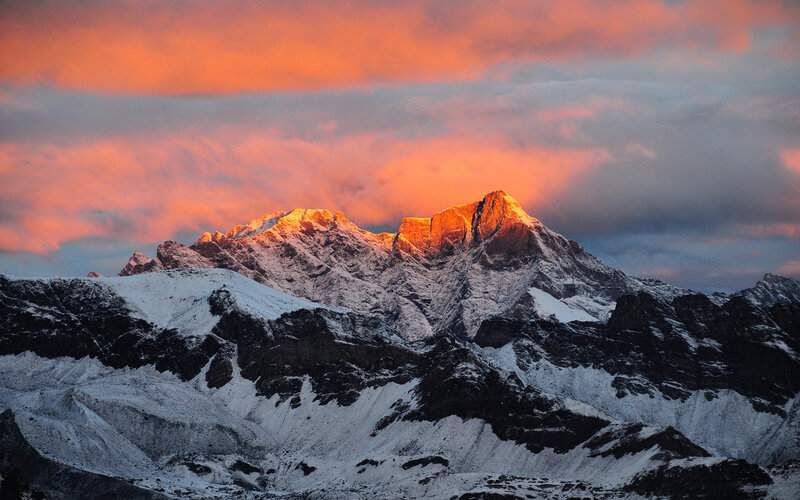 Snow-covered Mountain Peak — Orange, Dramatic, Sunrise, Photograph, Clouds