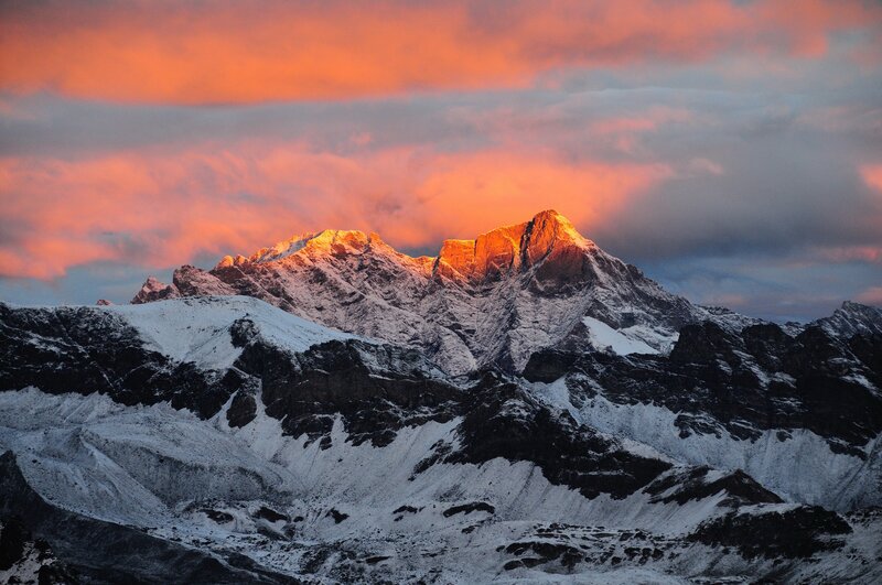 Snow-covered Mountain Peak — Orange, Dramatic, Sunset, Photograph, Clouds