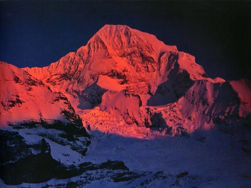 Snow-covered Mountain Peak — Red, Dramatic