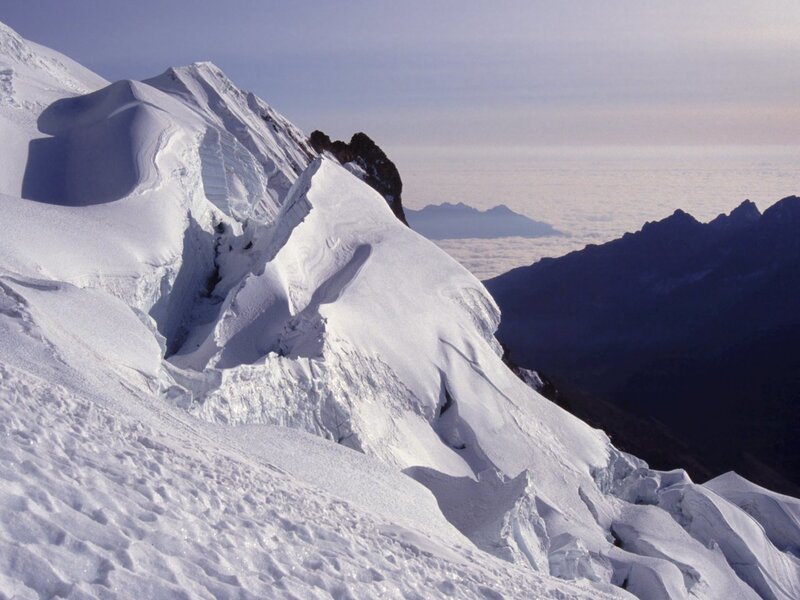 Snow-covered Mountain Peak — White, Dramatic, Morning