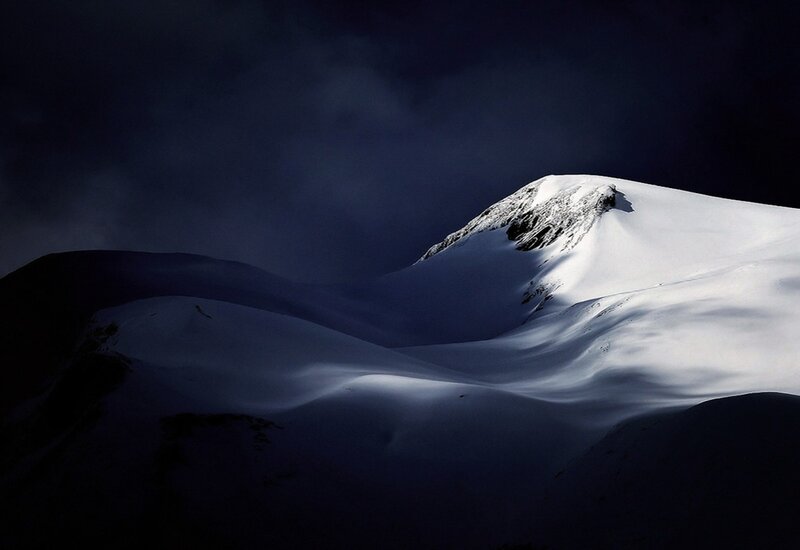 Snow-covered Mountain Peak — White, Dramatic, Night
