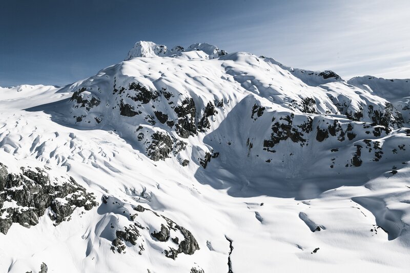 Snow-covered Mountain Peak — White, Dramatic, Winter, Photograph, Rock, Sky
