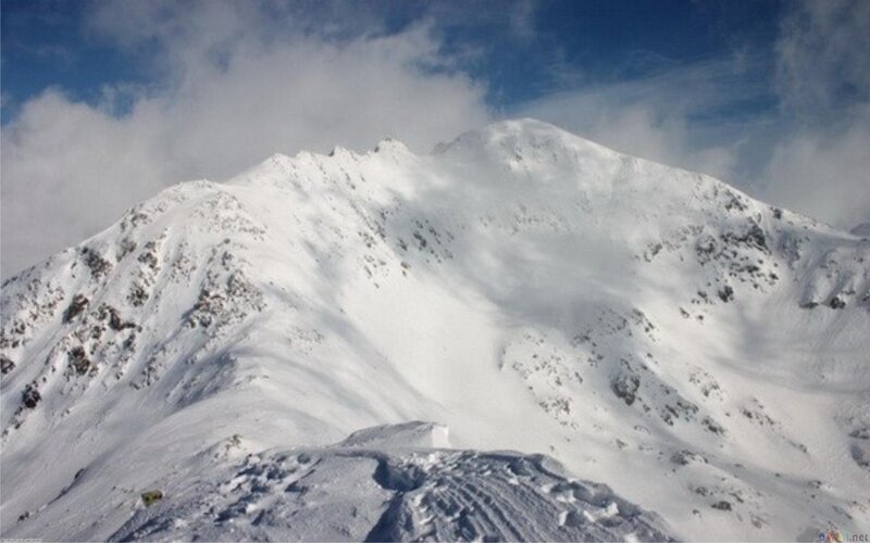 Snow-covered Mountain Peak — White, Dramatic, Winter, Photograph
