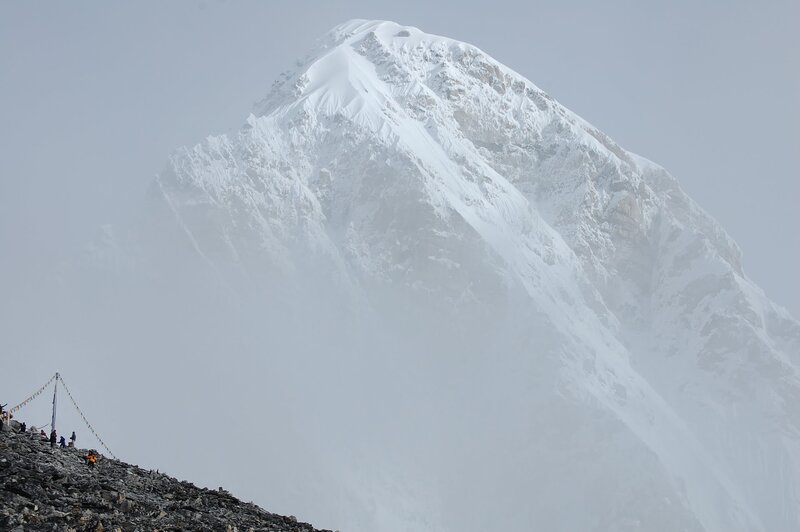 Snow-covered Mountain Peak — White, Misty