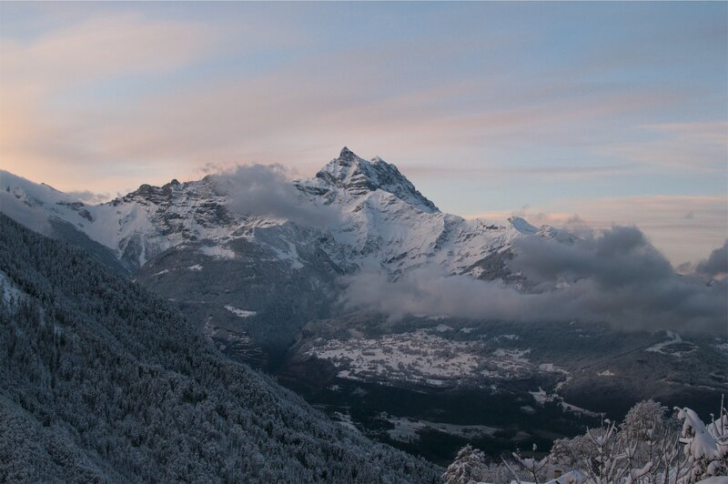 Snow-covered Mountain Peak — White, Serene, Winter, Photograph, Clouds, Forest