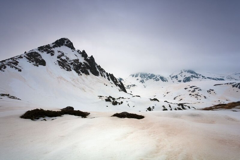 Snow-covered Mountain Peak — White, Serene, Winter