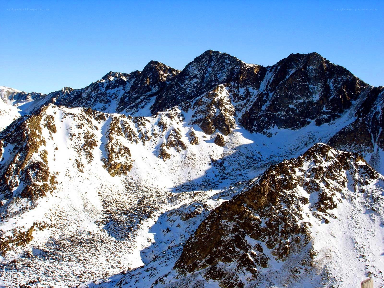 snow-covered mountain peaks