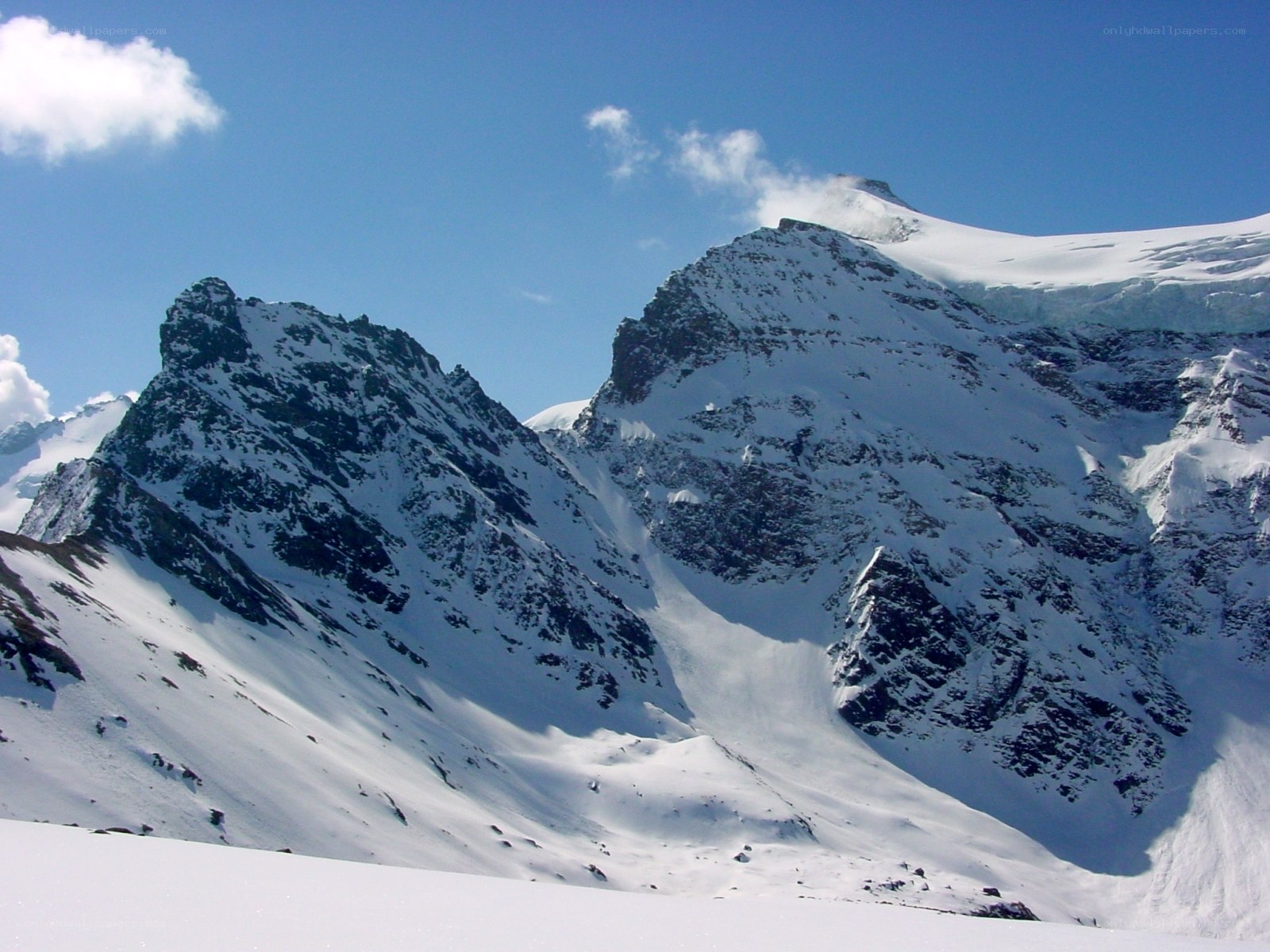 snow-covered mountain peaks