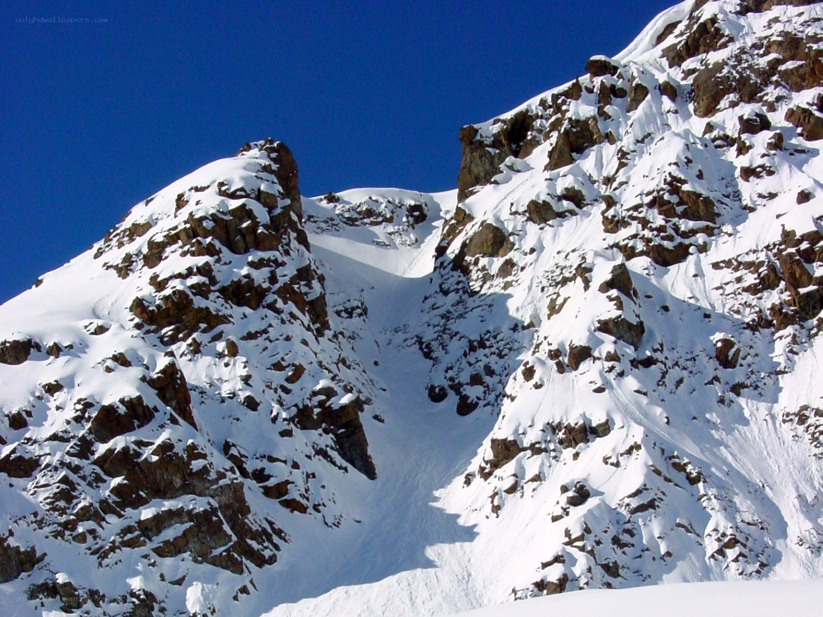 snow-covered mountain peaks