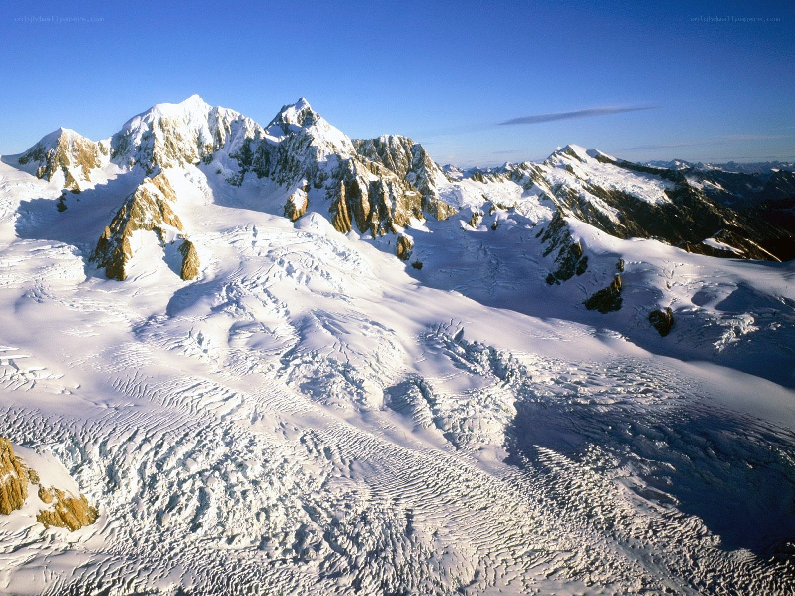 snow-covered mountain peaks