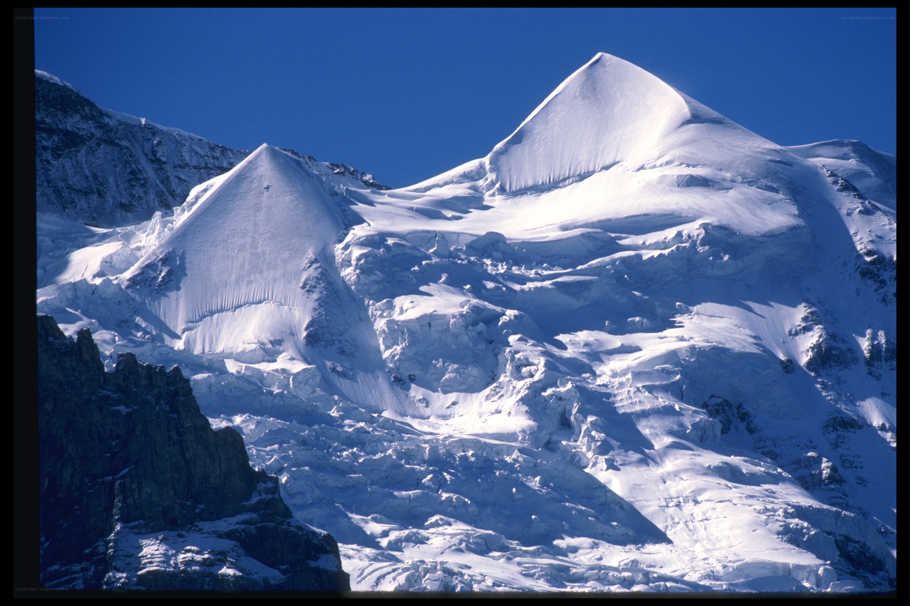 snow-covered mountain peaks